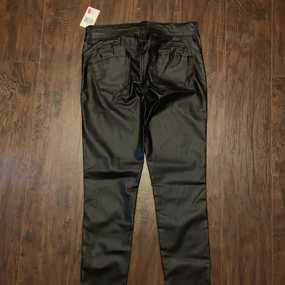 Mid rise faux leather skinny jeans